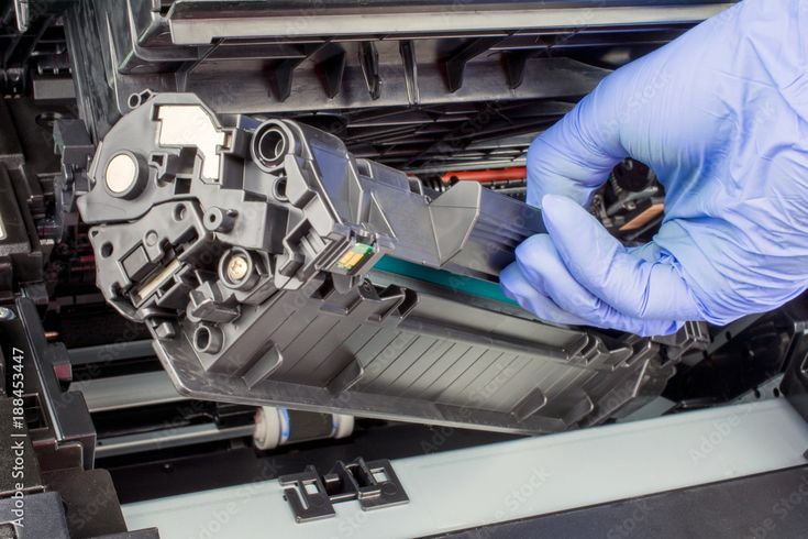 Printer technician at work